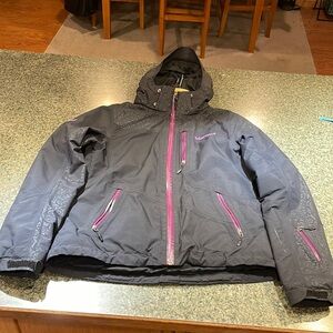 Marmot Small black with purple trim jacket.  Many pockets with hood.  Zip up